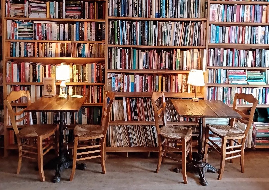 wall stacked with books at Boekowski Antwerp