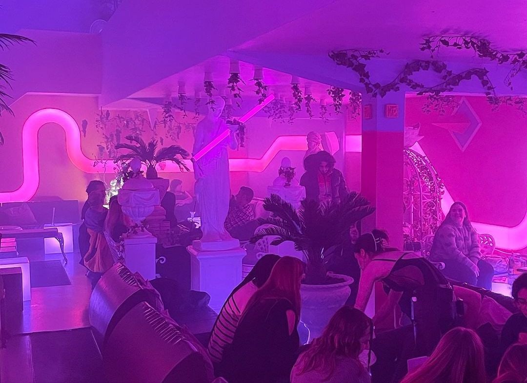 bright pink neon lighted interior at Limonada cocktail bar